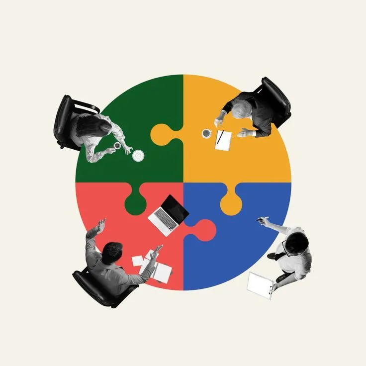 Four people working around a single assembled puzzle, seen from above